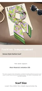 Dettaglio di un foulard in seta floreale da 70cm disteso su una rivista di moda