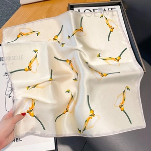 Elegant silk square scarf with yellow calla lily floral print on a beige satin base