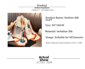 Detail of elegant silk-like shawl with colorful ginkgo leaf pattern on beige background
