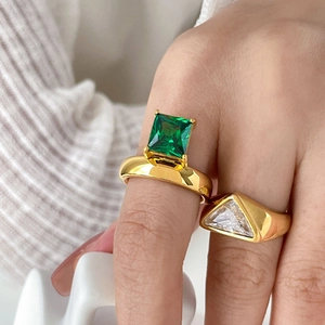 18K gold plated titanium rings set with emerald cut green zircon and triangle stone
