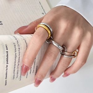 Creative mixed-metal multi-finger ring in 18K gold plated titanium steel for women