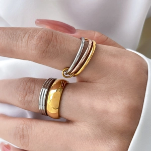 Three-color interlaced ring set and wide gold band set in 18K gold plated titanium steel