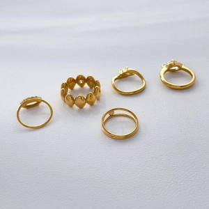 Five unique 18K gold plated titanium rings with teardrop and marquise cubic zirconia