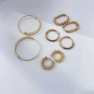 Set of four 18K gold plated titanium steel hoop earrings with black diamonds and beads