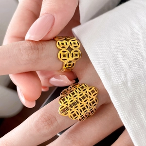 Gold titanium steel layered ring set with hollow coin and leaf patterns for luck