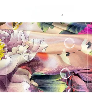 Detail of silk satin scarf featuring classic oriental peony and crane floral print