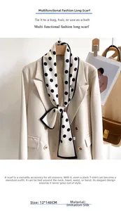 Detailed view of polka dot silk scarf measuring 12x148cm on beige blazer outfit