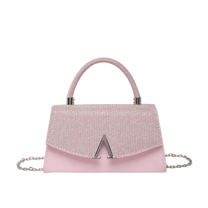 Pink sequin patchwork chain crossbody bag with silver V-shaped logo on white background