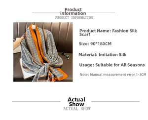 Macro view of 90x180cm silk satin scarf with orange and grey geometric chain print