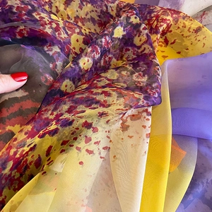 Oversized printed sun protection beach scarf with purple and yellow abstract pattern