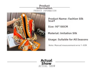 Close-up of leopard print faux silk scarf with orange blocks and 90x180cm dimensions