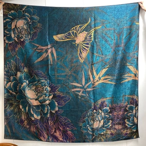 Detail of floral silk shawl featuring peony patterns and golden butterfly outlines