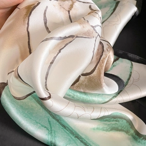 Elegant mulberry silk square scarf with hand-painted floral pattern in white and green