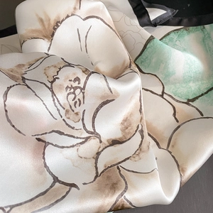 Elegant mulberry silk scarf with large camellia floral print and soft satin luster