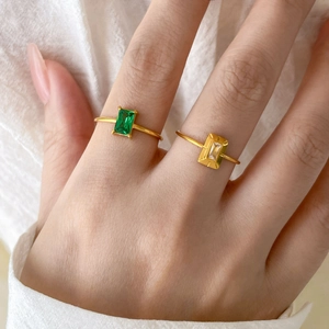 Delicate 18K gold plated titanium ring set with green and clear zircon stones