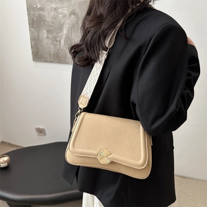Beige lychee pattern shoulder bag with jacquard wide strap and gold metal buckle