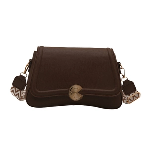 Minimalist chocolate brown leather square bag with a bohemian patterned wide strap
