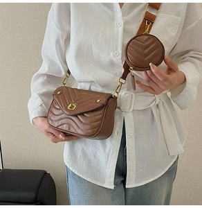Brown quilted leather shoulder bag set with wide strap and mini round coin pouch