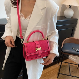 Rose pink embossed leather handbag with golden H-buckle and floral lace texture
