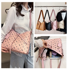 Internal capacity of the printed tote bag showing space for a tablet and daily items
