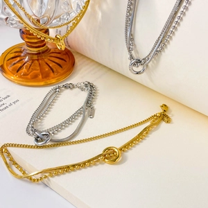 Three-layer chunky hollow punk chain necklace in gold and silver finish with K18 tag
