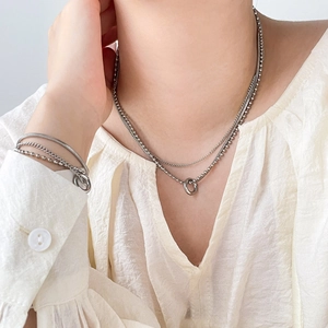 Minimalist silver multi-layer necklace and bracelet set with double ring pendant and beads