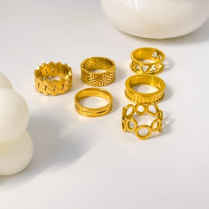 Six-piece 18K gold plated titanium steel rings with hollow patterns and gear engravings