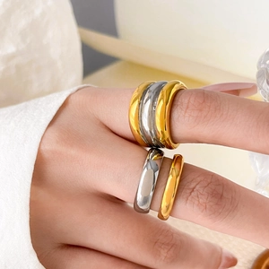 Three-layer stacked minimalist mixed metal rings in gold and silver polished titanium steel
