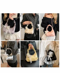 Collage of pleated crescent bags in multiple colors featuring decorative pearl charms