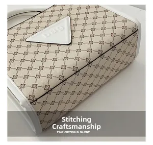 Close-up of precise stitching process on the bottom of this stylish patterned tote bag