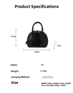 Detail of black crocodile texture PU leather shell bag with gold hardware and dimensions