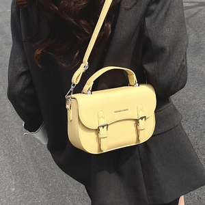 Retro yellow lychee grain saddle bag for women with top handle and crossbody strap