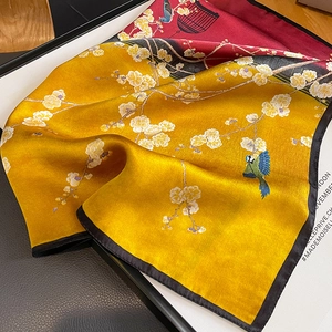 Classic Chinese silk scarf featuring yellow and red contrast with plum blossom and bird print