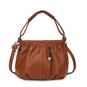 Brown lychee leather handbag with pleated opening and detachable shoulder strap