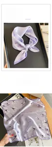 Détail de foulard en soie violette avec imprimé tulipe vintage et texture soyeuse