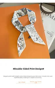 Detail of 5x85cm narrow twill silk scarf with hand-drawn swallow and balloon prints