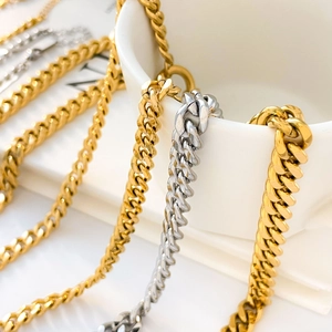 Double layer snake bone and rice grain chain necklace in gold and silver finish