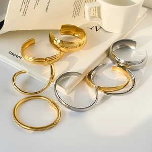Minimalist gold and silver wide surface open bangles and snake chain bracelets set