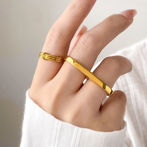 Modern 18K gold-plated titanium rings with triple-layer twist and mama letter design