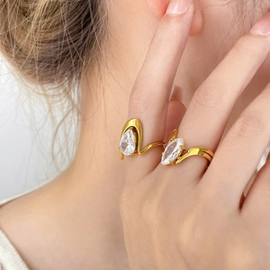 18K gold plated titanium ring set with pear and marquise cut zircon gemstones