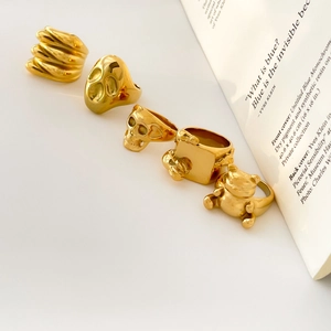 Ensemble de cinq bagues punk tête de mort et ours en acier inoxydable plaqué or 18K