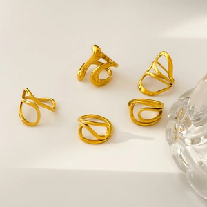 Set of 18K gold-plated stainless steel rings with minimalist curved and abstract designs