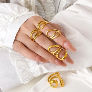 Abstract curved hollow wave ring in 18K gold plated titanium steel for women
