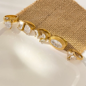 Luxury 18K gold plated titanium rings set with large clear cubic zirconia in various cuts