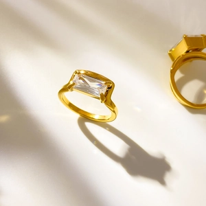Detailed view of 18K gold plated ring with large rectangular zircon and shadow effects