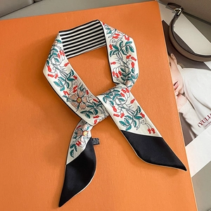 Floral printed long silk scarf on a luxury orange gift box with vintage berry patterns