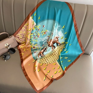 Elegant silk-like square scarf featuring artistic elephant and bird illustration prints