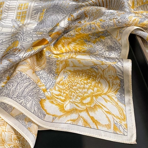 Elegant jungle print silk square scarf with yellow and gray tropical floral patterns