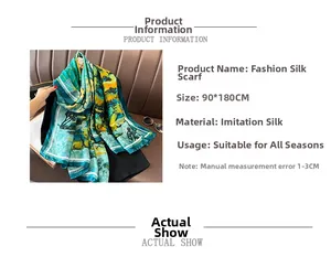Detail of teal silk shawl with tropical prints and 90x180cm size specifications