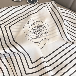 Fashionable silk scarf with camellia flower print and black geometric stripes on white